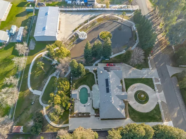 a front view of a house with yard