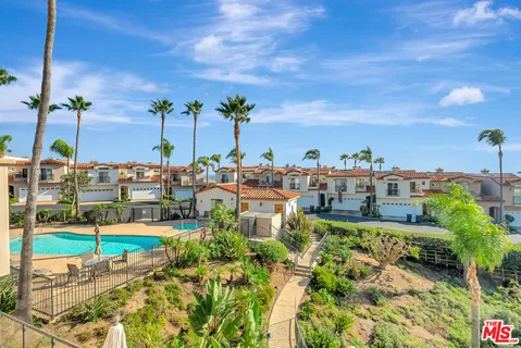 an aerial view of a swimming pool