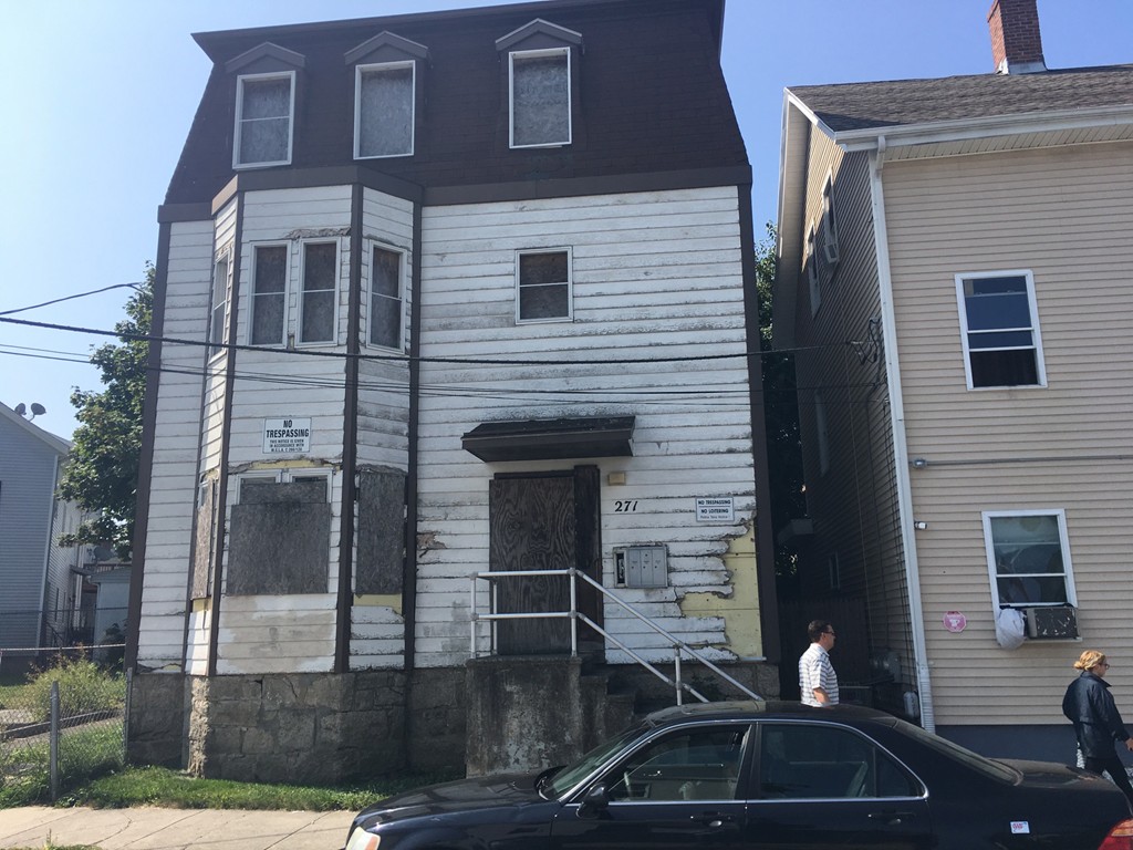 271 Morgan Street Fall River, MA 02721 - Photo 1 of 1 a couple of cars parked in front of a house