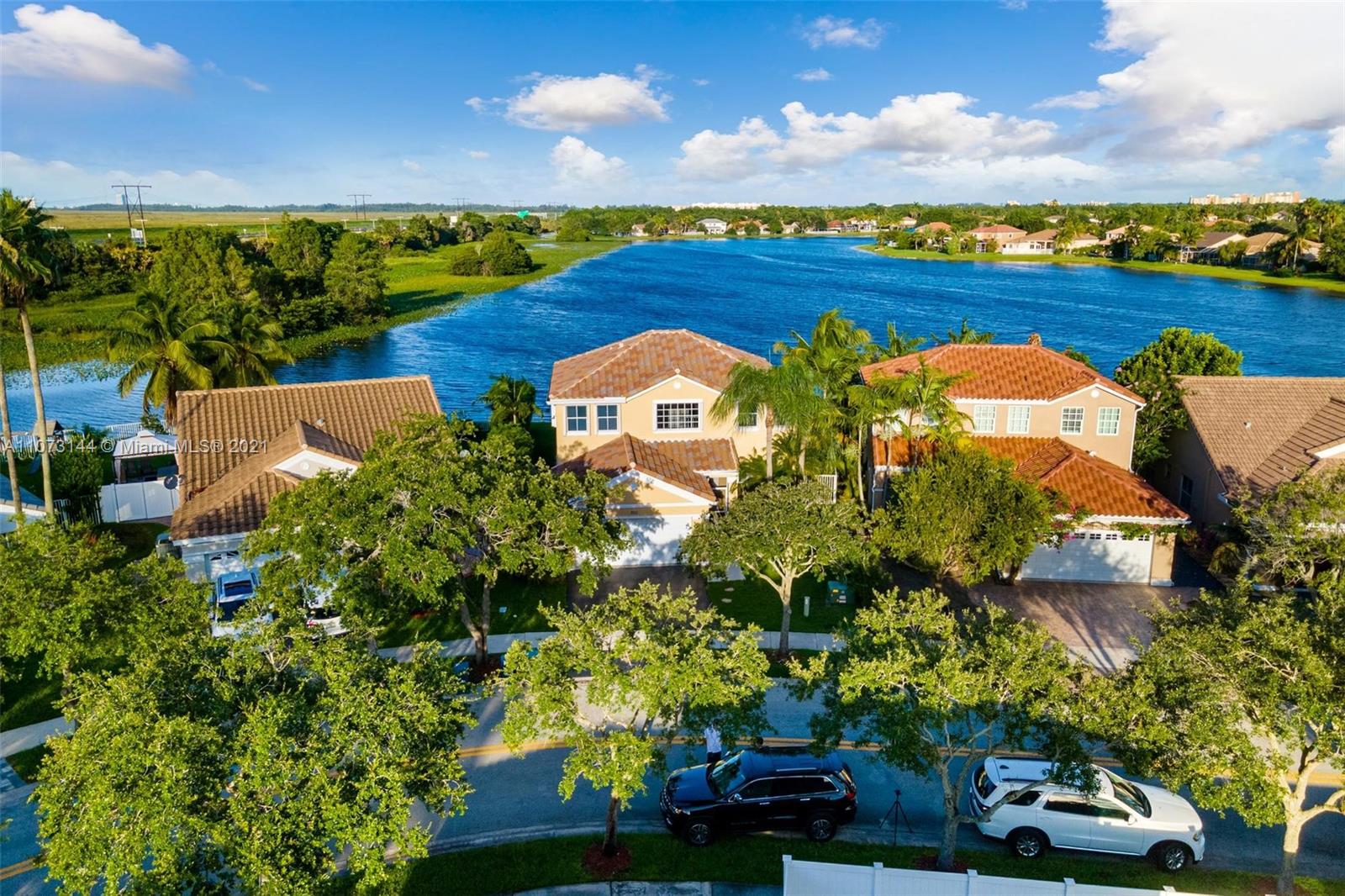955 Falling Water Road Weston, FL 33326 - Photo 4 of 38 Aerial shot of the property and the neighborhood