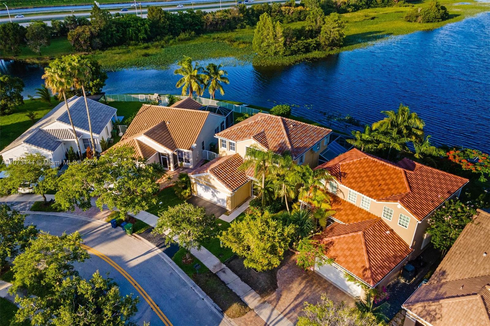 955 Falling Water Road Weston, FL 33326 - Photo 5 of 38 Aerial shot of the property and the neighborhood