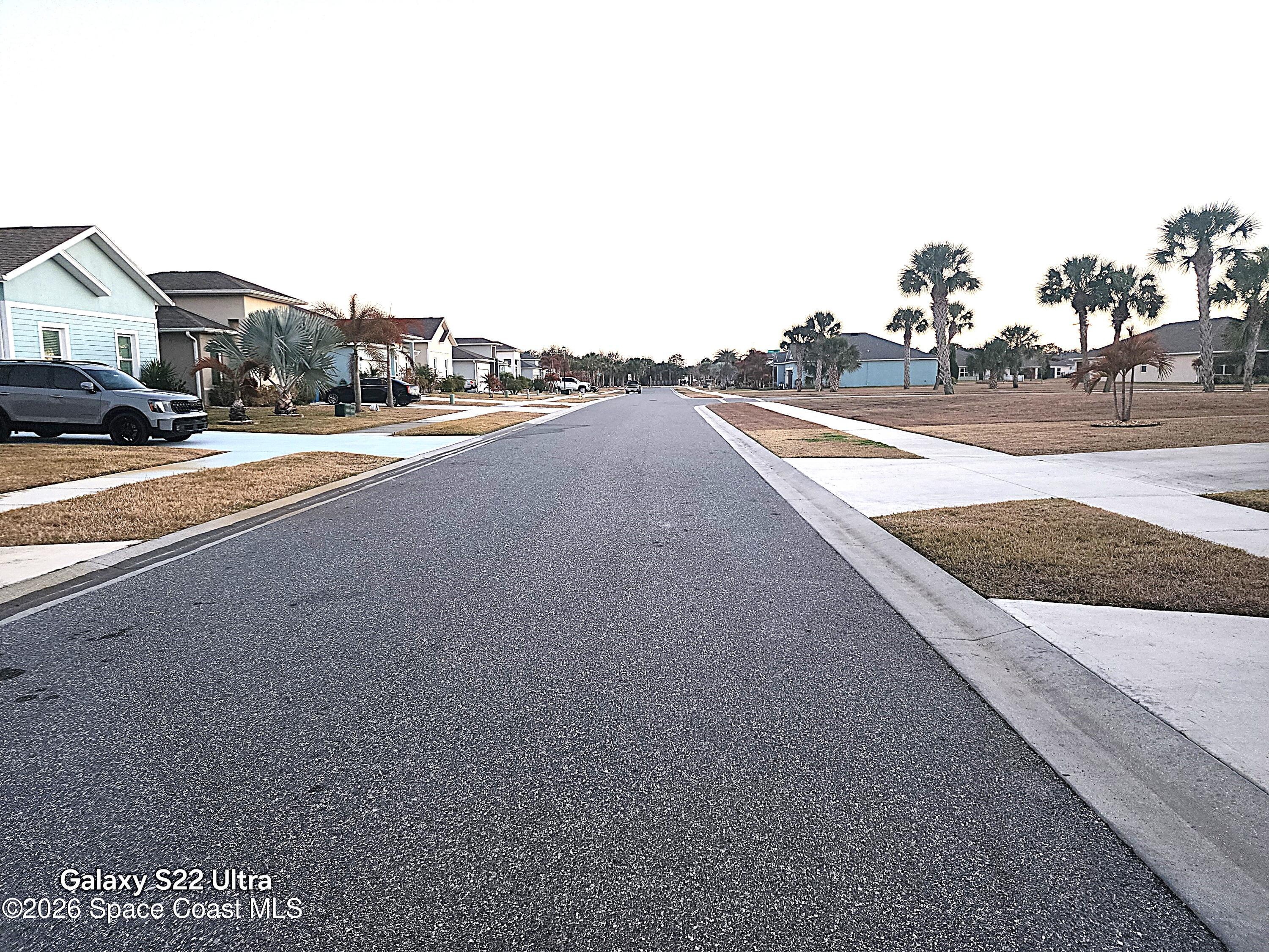 1043 Corbin Circle Southwest Palm Bay, FL 32908 - Photo 5 of 18 a view of street with cars