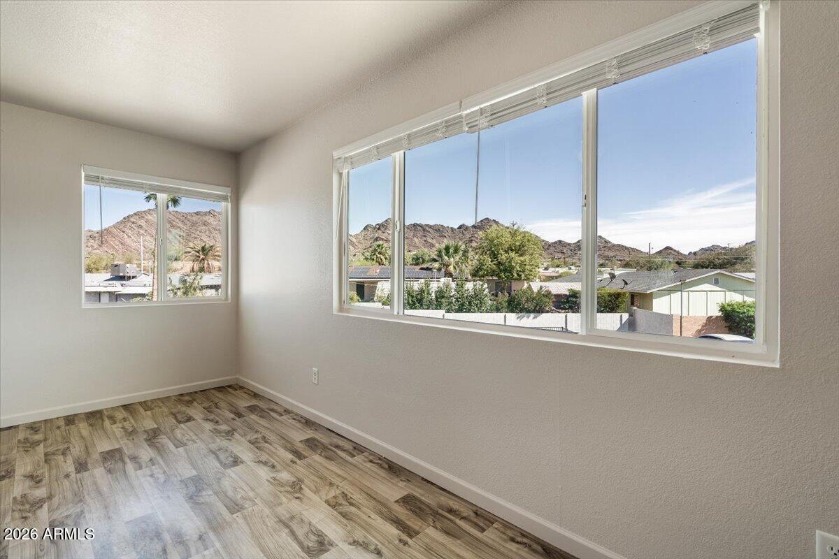 1346 East Mountain View Road, Unit 207 Phoenix, AZ 85020 - Photo 16 of 31 an empty room with a window