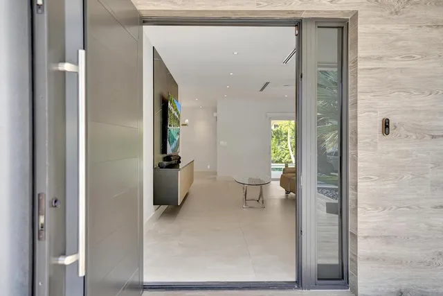 a kitchen with a sink and appliances