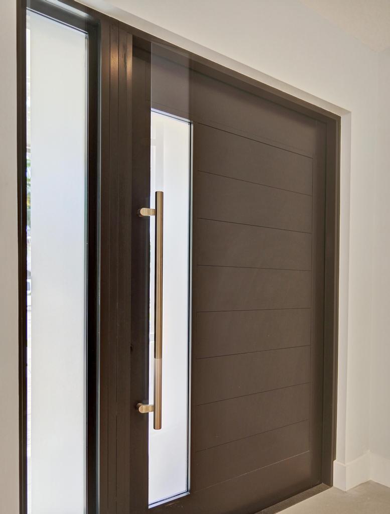 775 Northeast 39th Street Boca Raton, FL 33431 - Photo 18 of 88 a bathroom with a glass door