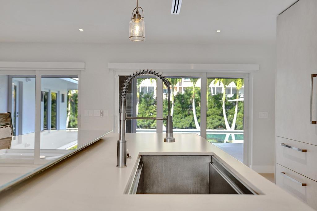 775 Northeast 39th Street Boca Raton, FL 33431 - Photo 24 of 88 a view of a living room and front door