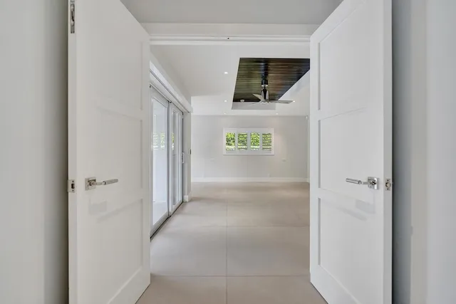 a bathroom with a sink a mirror and a shower