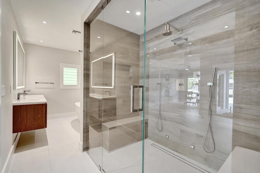 775 Northeast 39th Street Boca Raton, FL 33431 - Photo 34 of 88 a bathroom with a shower and a sink