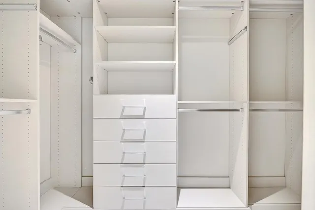 a view of a living room with a large window