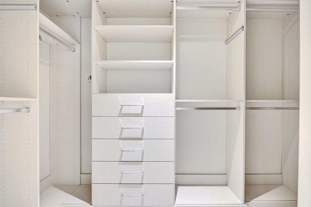 775 Northeast 39th Street Boca Raton, FL 33431 - Photo 38 of 88 a view of walk in closet with empty racks