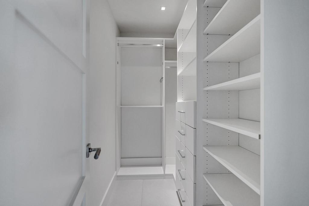 775 Northeast 39th Street Boca Raton, FL 33431 - Photo 40 of 88 a view of an empty walk in closet
