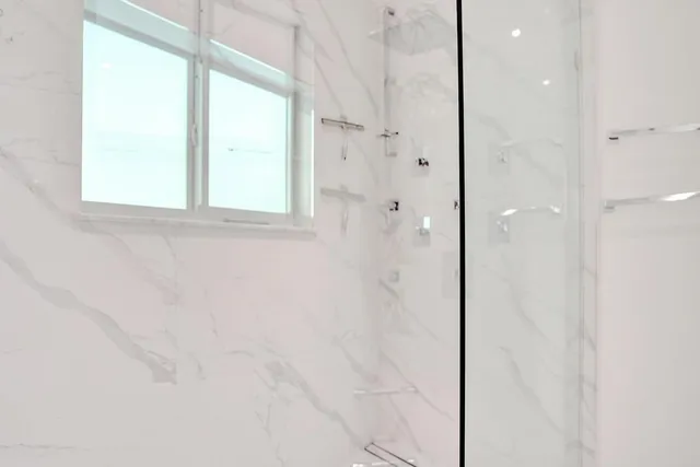 an aerial view of a house with a garden