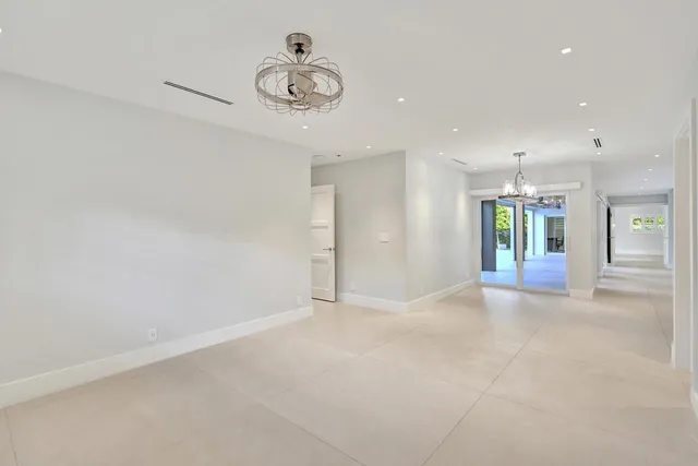 a picture of a bathroom with mirror