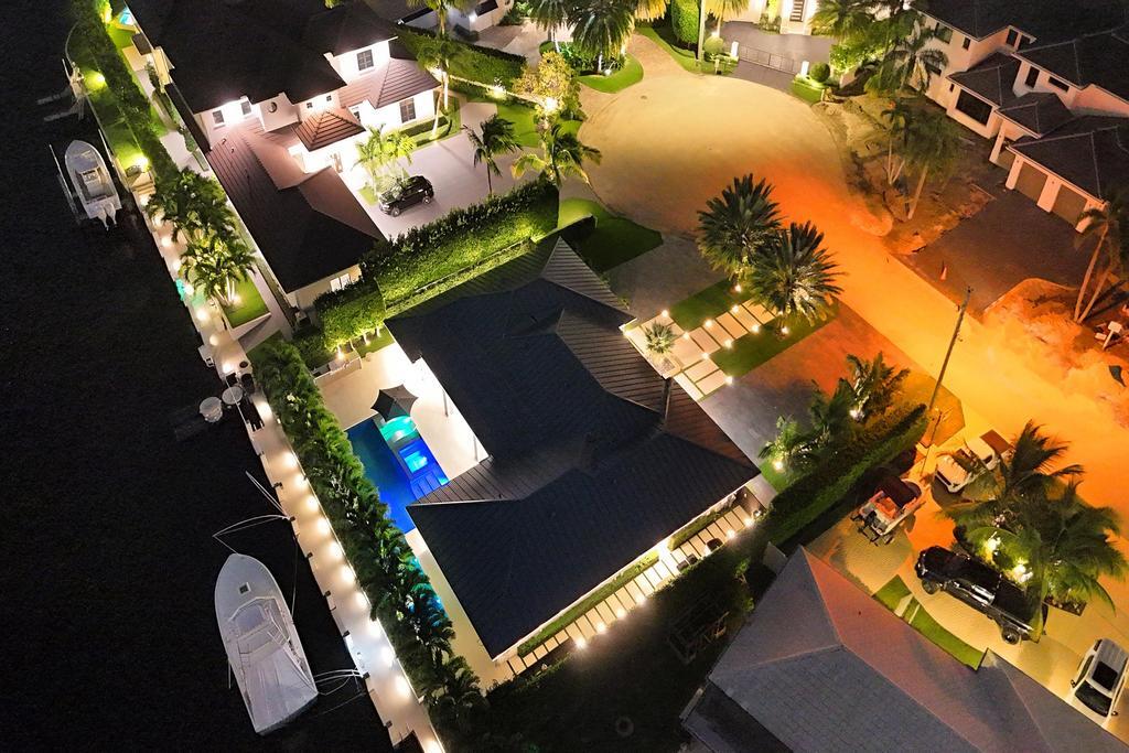 775 Northeast 39th Street Boca Raton, FL 33431 - Photo 86 of 88 an aerial view of a house a yard and outdoor seating