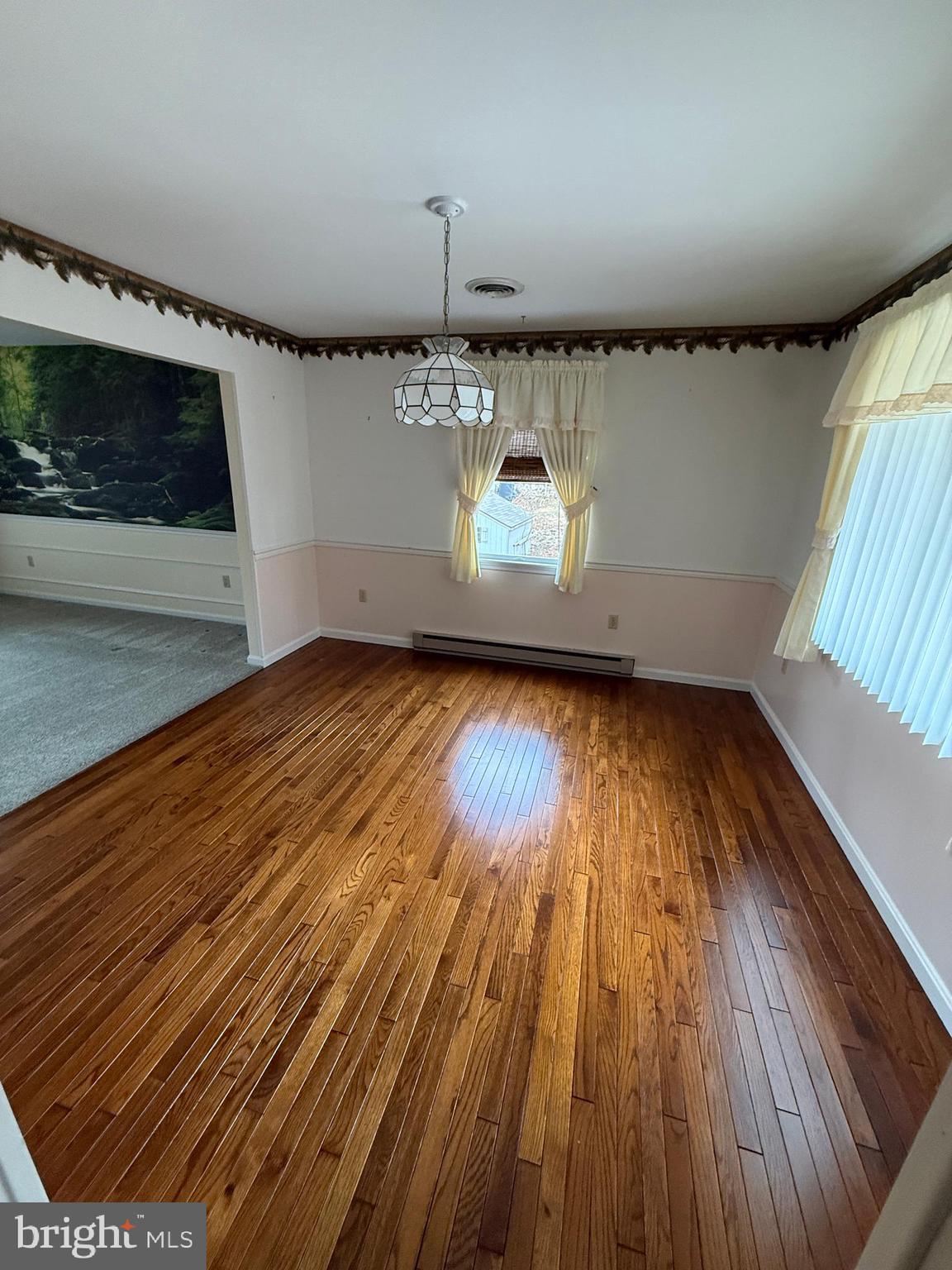 10984 Old Forge Road Waynesboro, PA 17268 - Photo 11 of 57 a view of an empty room with wooden floor and a window