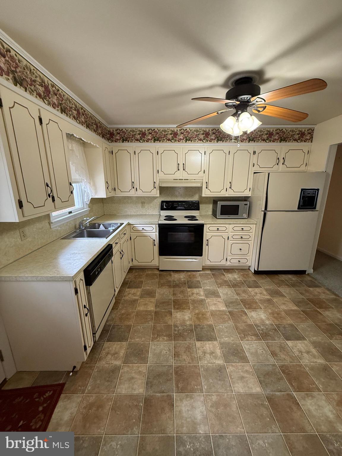10984 Old Forge Road Waynesboro, PA 17268 - Photo 14 of 57 a kitchen with granite countertop a sink a counter top space appliances and cabinets