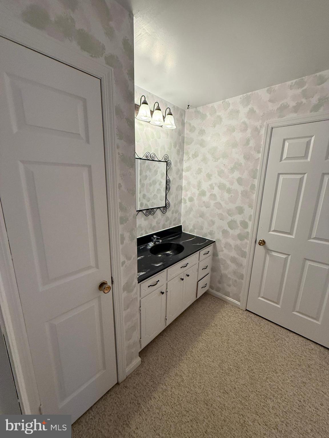 10984 Old Forge Road Waynesboro, PA 17268 - Photo 36 of 57 a bathroom with a sink a toilet and a mirror