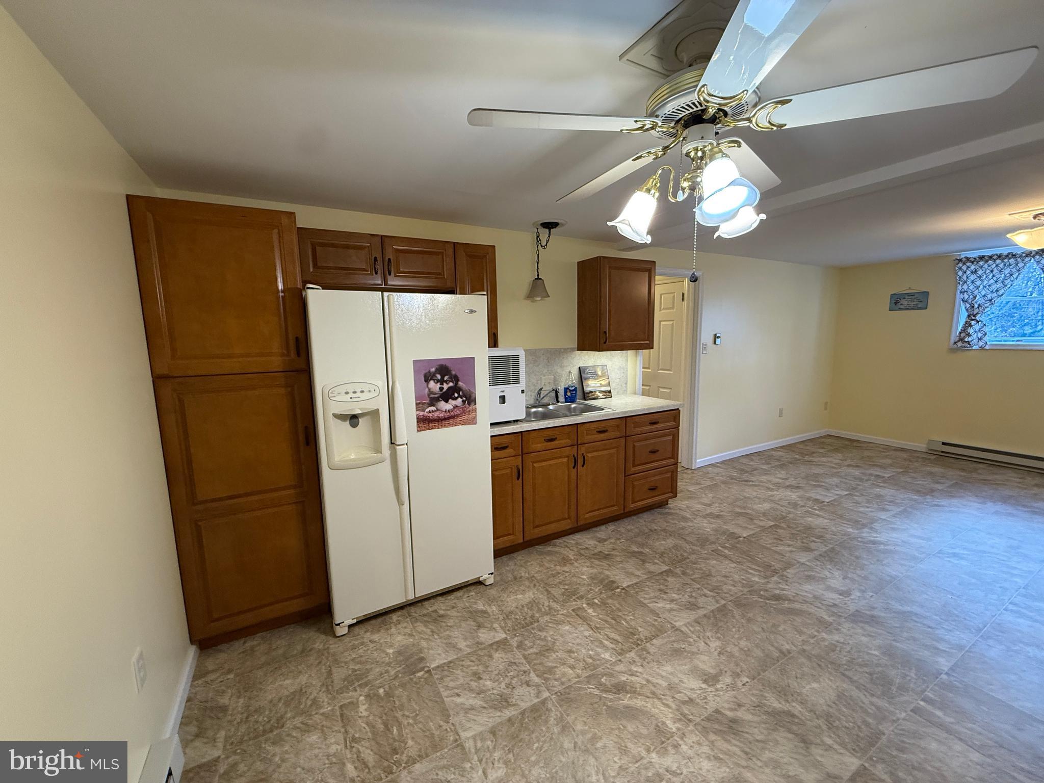 10984 Old Forge Road Waynesboro, PA 17268 - Photo 40 of 41 a utility room with cabinets dryer and washer