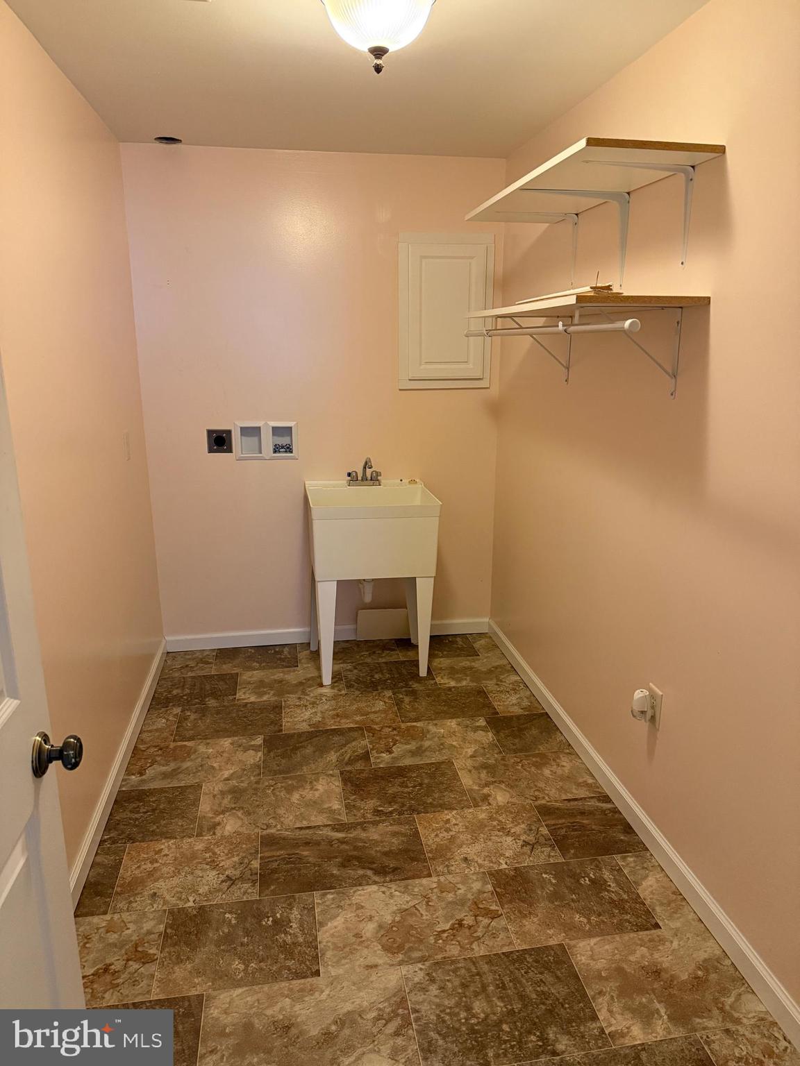 10984 Old Forge Road Waynesboro, PA 17268 - Photo 49 of 57 a view of a room with rack on the wall and a table