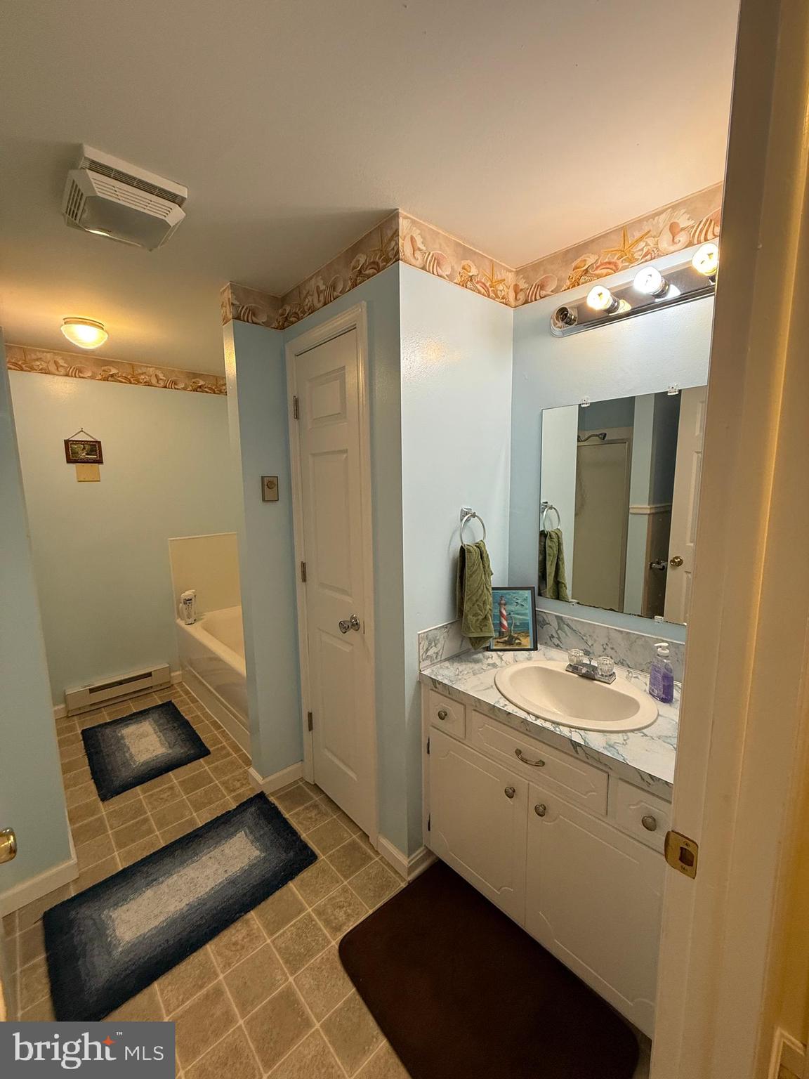 10984 Old Forge Road Waynesboro, PA 17268 - Photo 54 of 57 a bathroom with a sink and a mirror