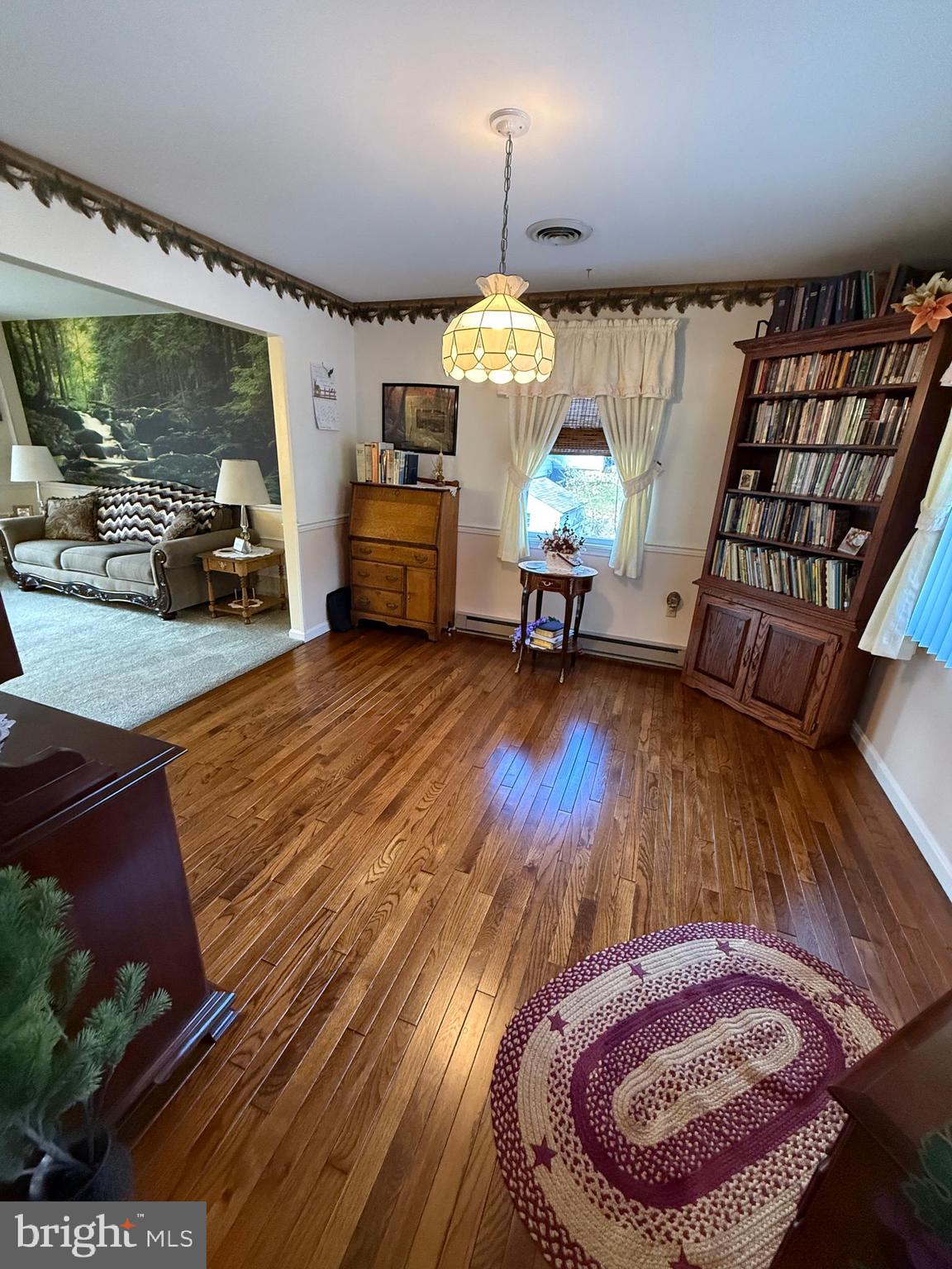 10984 Old Forge Road Waynesboro, PA 17268 - Photo 10 of 41 a living room with furniture and a wooden floor