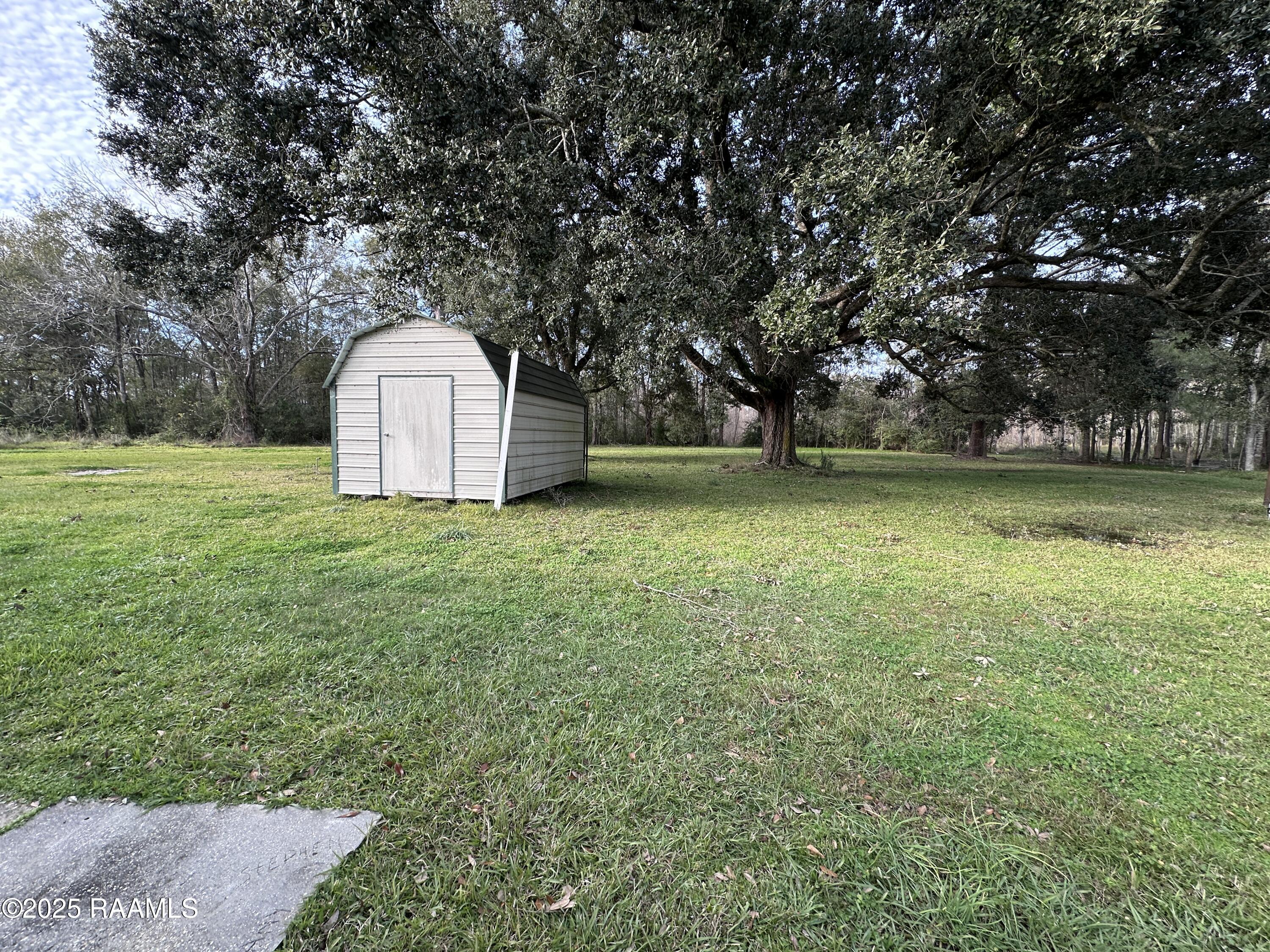 8606 Sand Pit Road Abbeville, LA 70510 - Photo 15 of 16 back yard