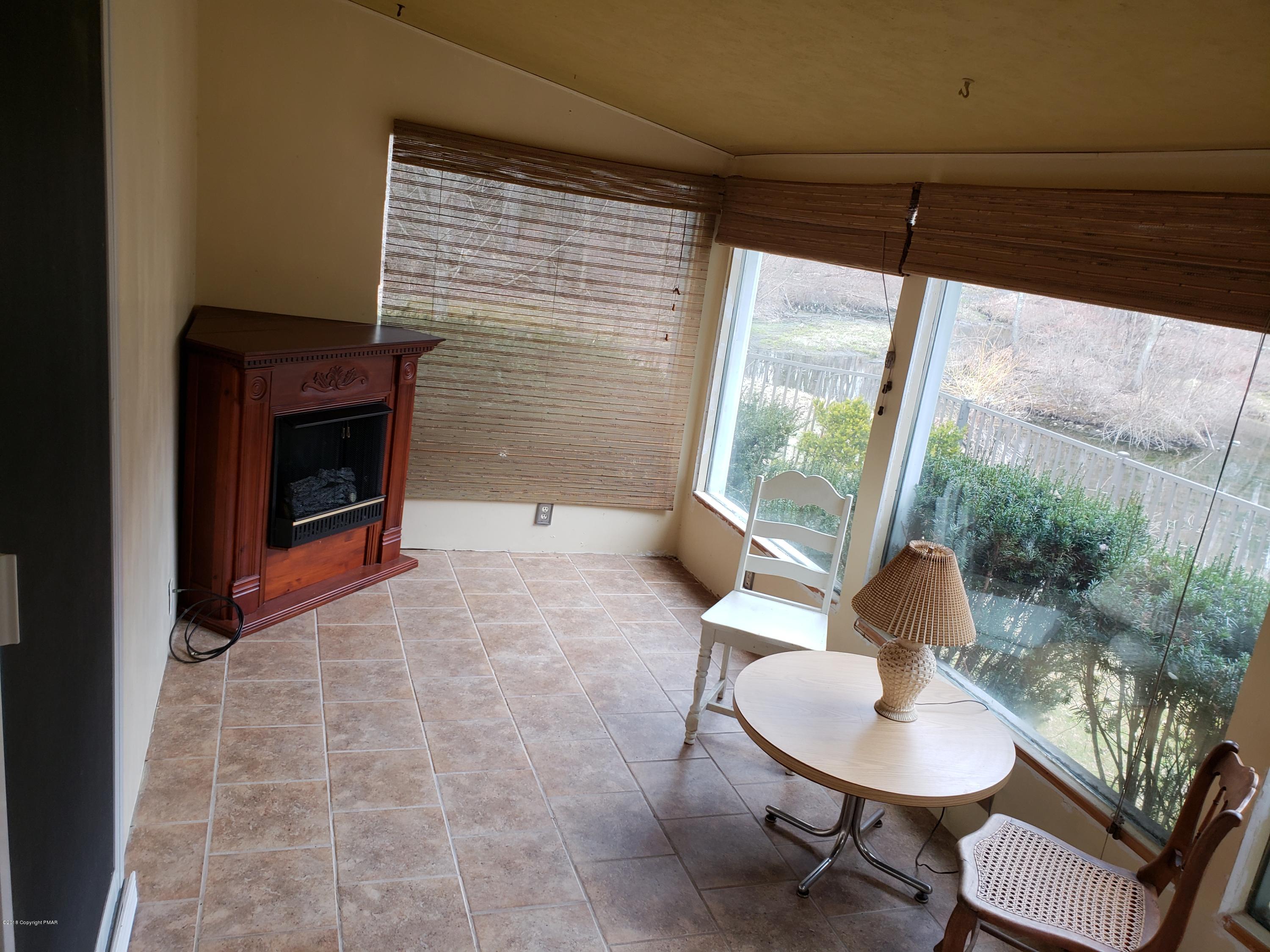 176 Learn Road Tannersville, PA 18372 - Photo 10 of 14 Sun room
