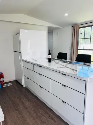 a room with a sink and a window