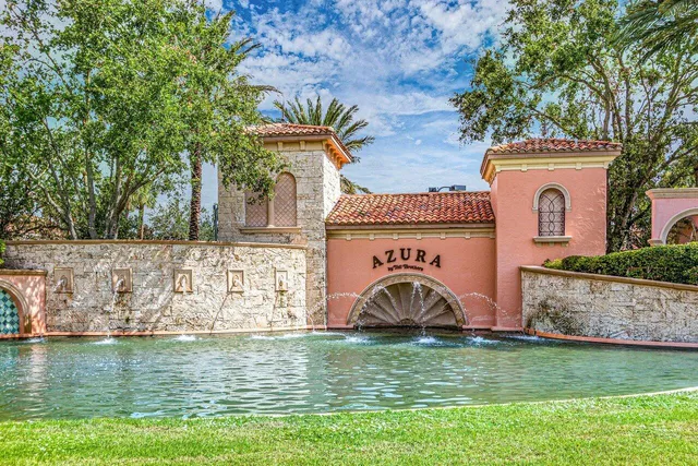 a front view of a house with garden space and swimming pool