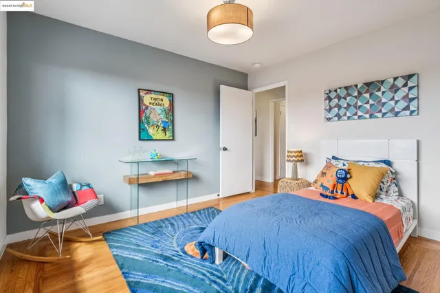 a dining table with a potted plant on the kitchen counter top and a potted plant