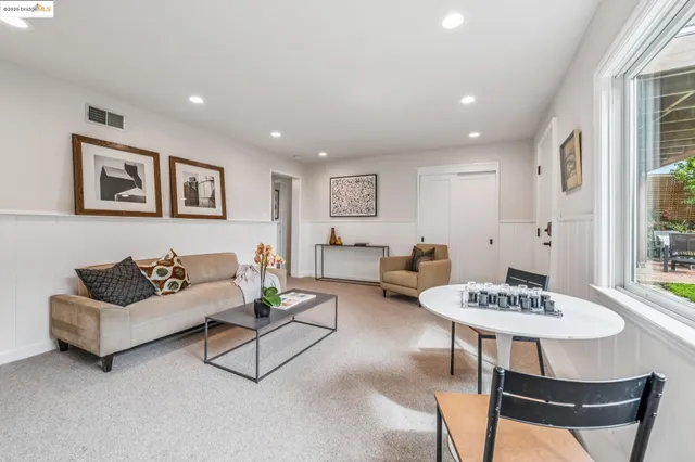 a view of bench and some plants