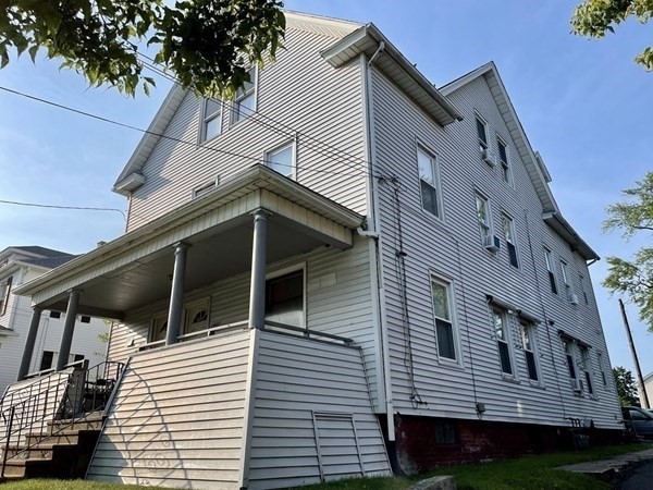 1409 Worcester Street Springfield, MA 01151 - Photo 2 of 12 a view of a house with a deck