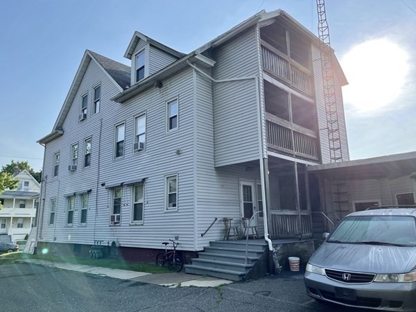 1409 Worcester Street Springfield, MA 01151 - Photo 3 of 12 a view of a house with a yard