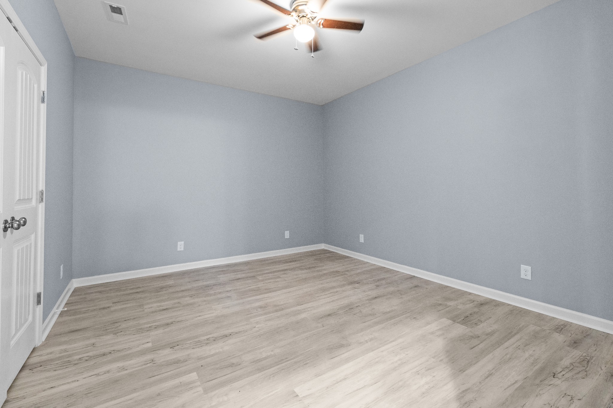 115 Freeman Street, Unit A Tullahoma, TN 37388 - Photo 11 of 25 wooden floor in an empty room