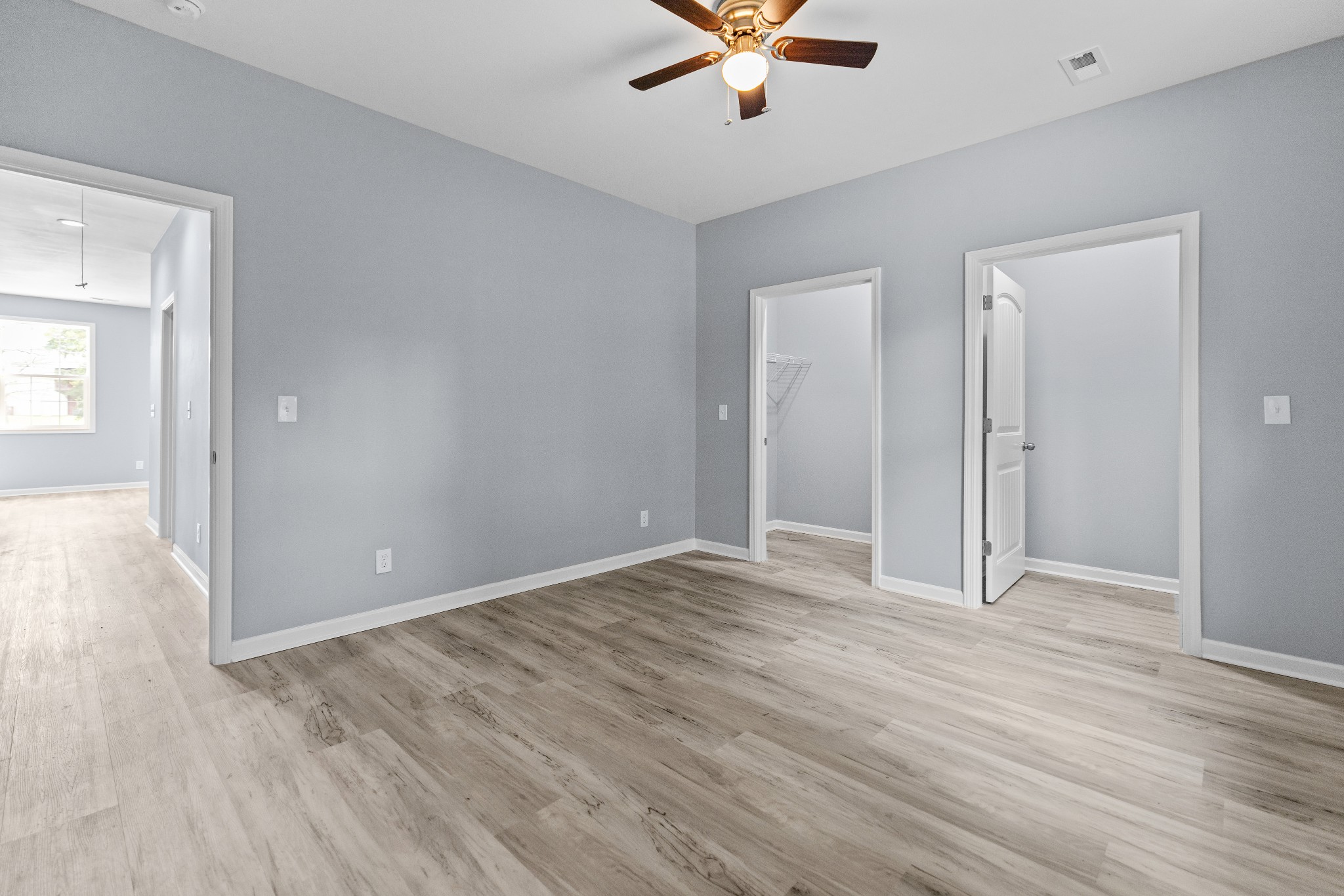 115 Freeman Street, Unit A Tullahoma, TN 37388 - Photo 15 of 25 wooden floor in an empty room with a window