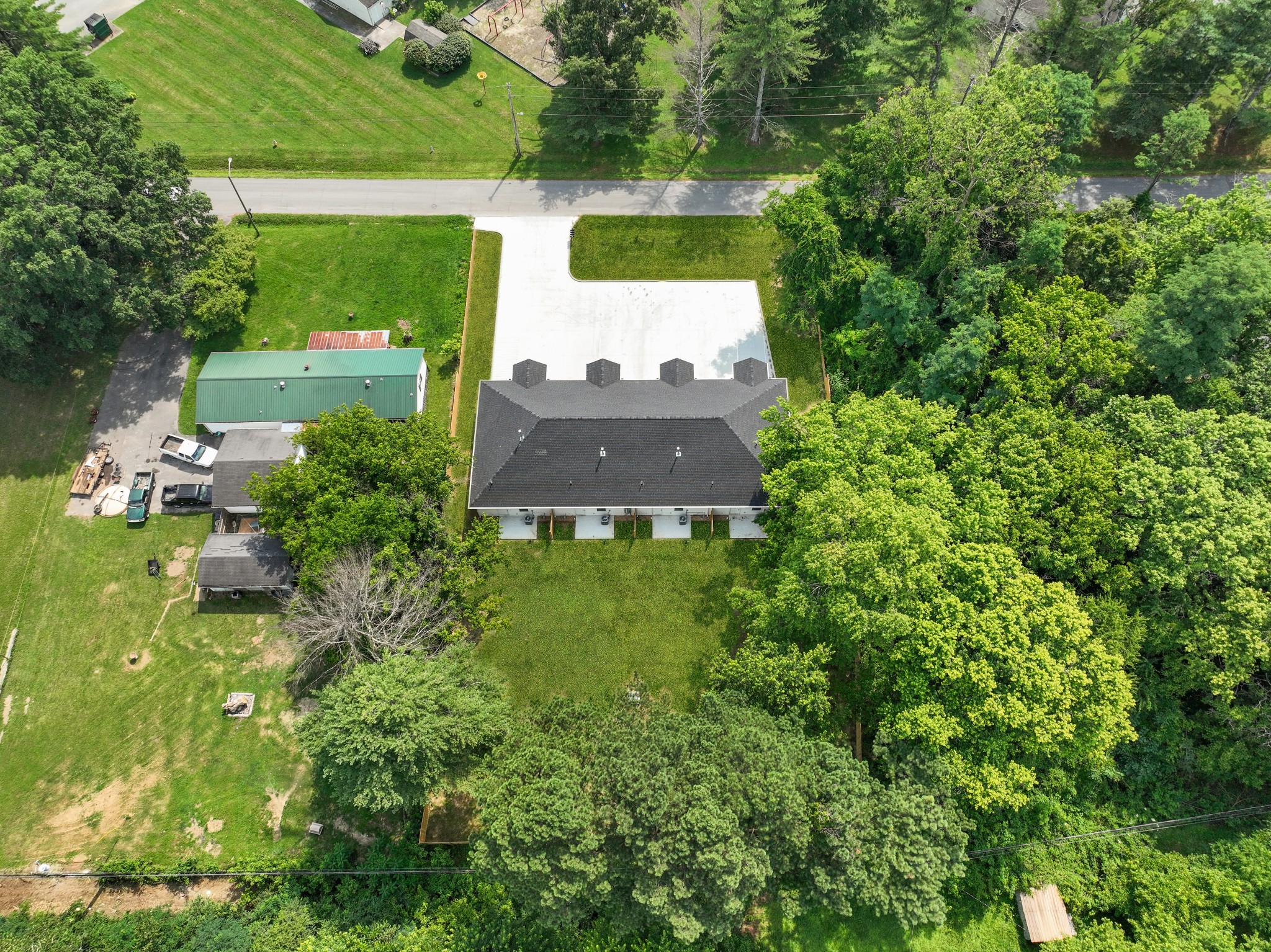 115 Freeman Street, Unit A Tullahoma, TN 37388 - Photo 24 of 25 an aerial view of a house with a yard and lake view
