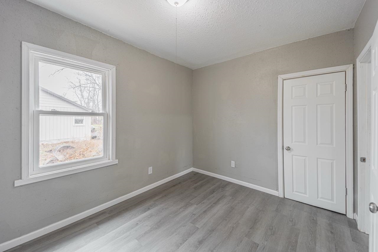 11783 Genessee Street Rockton, IL 61072 - Photo 13 of 31 an empty room with windows