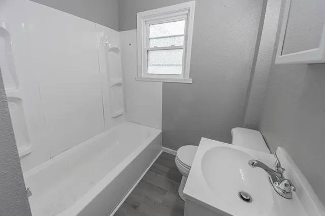 a bathroom with a sink and a bathtub