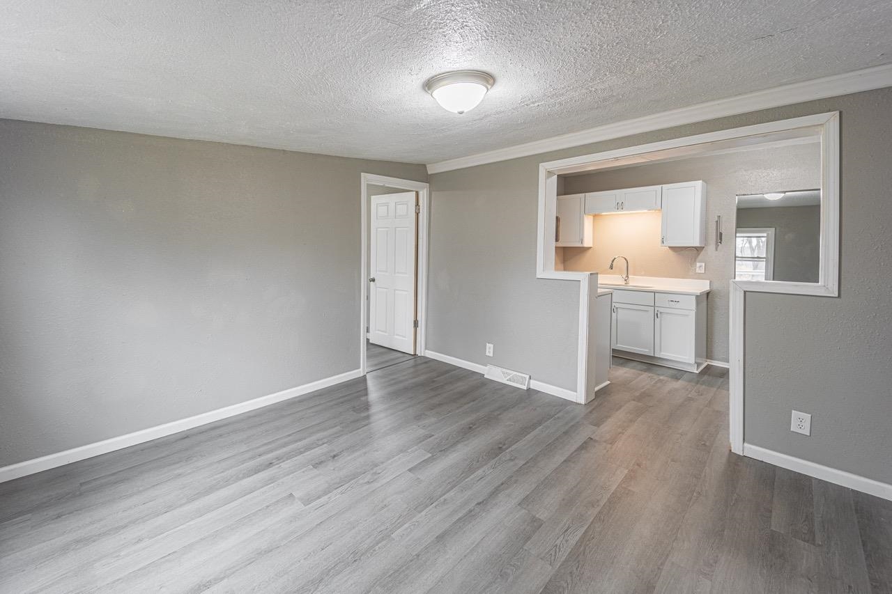 11783 Genessee Street Rockton, IL 61072 - Photo 22 of 31 wooden floor in an empty room with a window