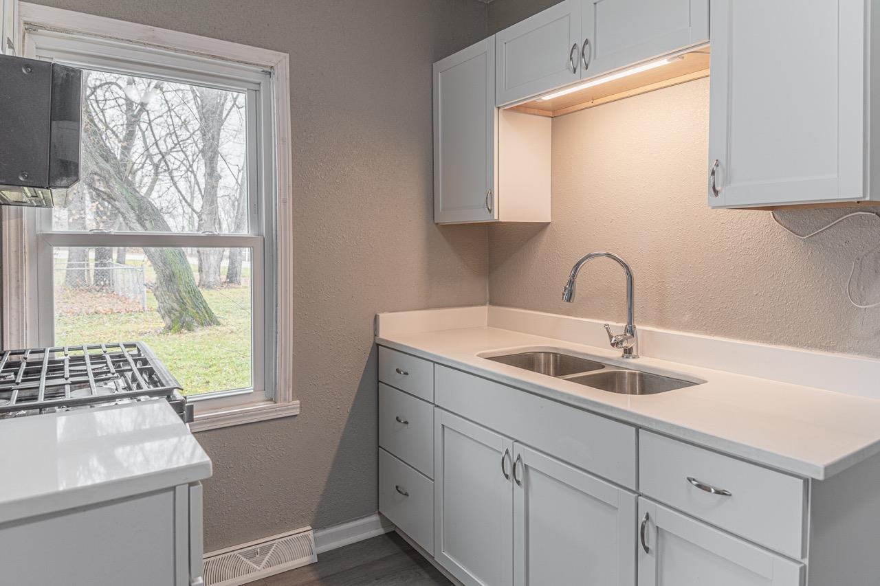 11783 Genessee Street Rockton, IL 61072 - Photo 28 of 31 a kitchen with a sink and a window