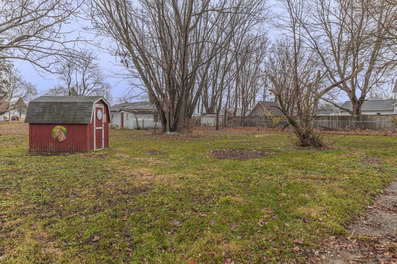 11783 Genessee Street Rockton, IL 61072 - Photo 4 of 31 a fire hydrant in the middle of a field