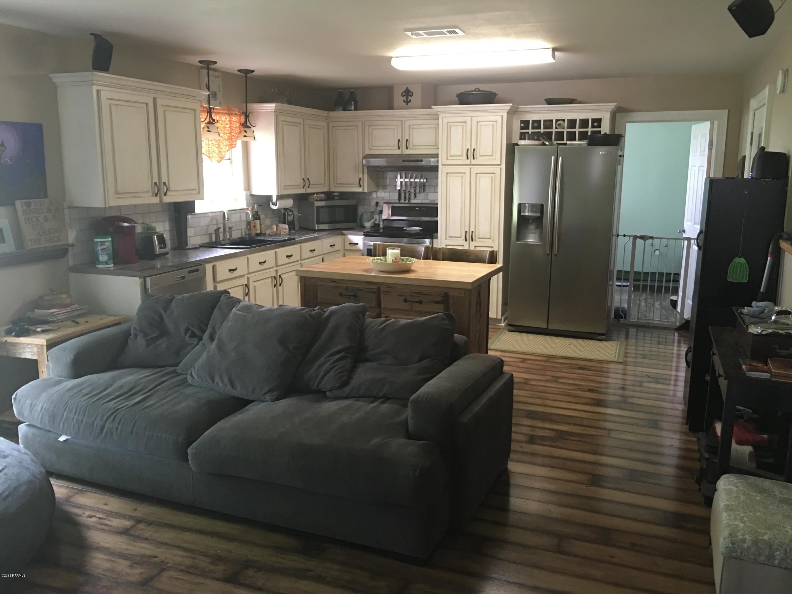 7372 Cemetery Road St. Martinville, LA 70582 - Photo 2 of 13 Living and kitchen