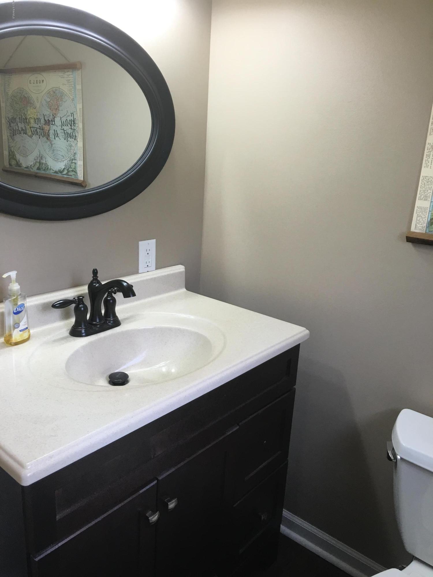 7372 Cemetery Road St. Martinville, LA 70582 - Photo 8 of 13 Half-bath off owner's bedroom