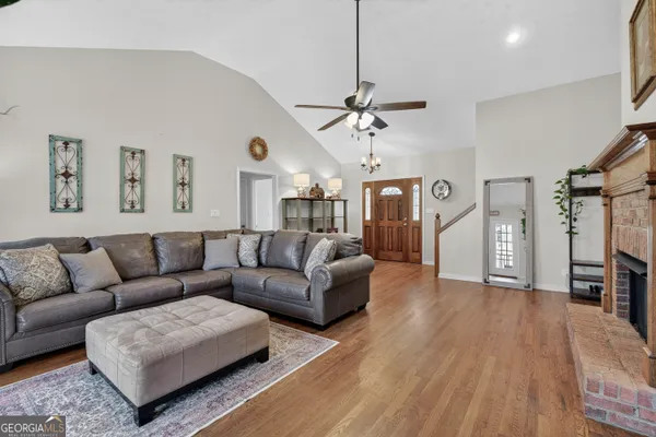 a view of a workspace with furniture and cabinet