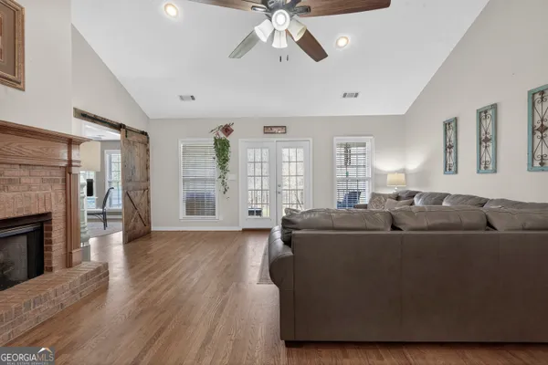 a view of a house with a yard and plants