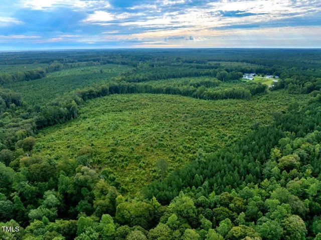 a view of a yard with an outdoor space