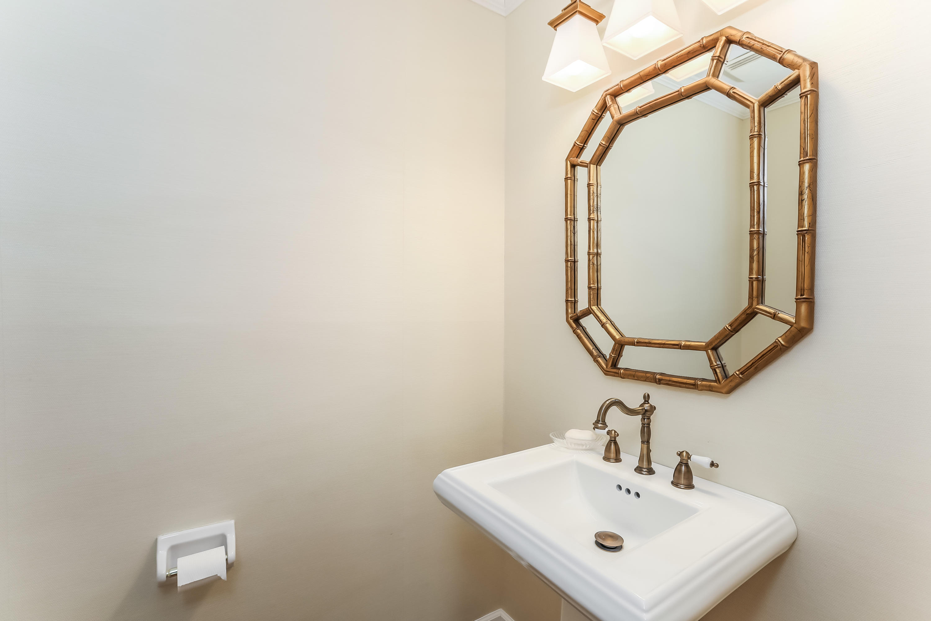 5 Watch Tower Road Darien, CT 06820 - Photo 14 of 27 a bathroom with a sink and a mirror