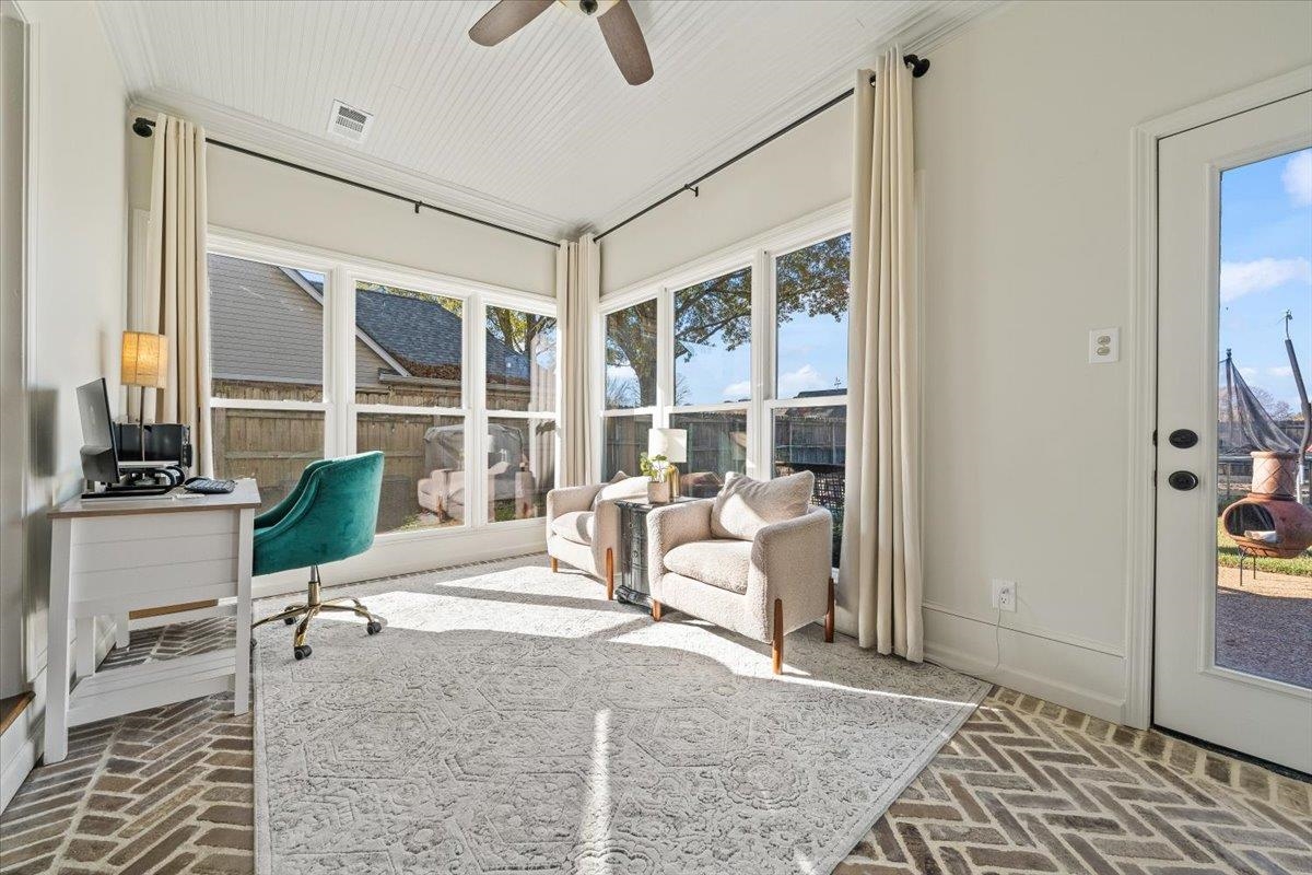 621 Fox Lair Cove Collierville, TN 38017 - Photo 12 of 37 a living room with furniture and a window