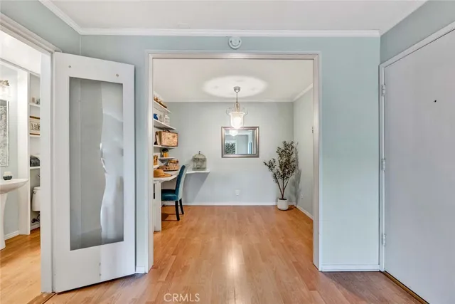 a kitchen with stainless steel appliances granite countertop a sink a stove and cabinets