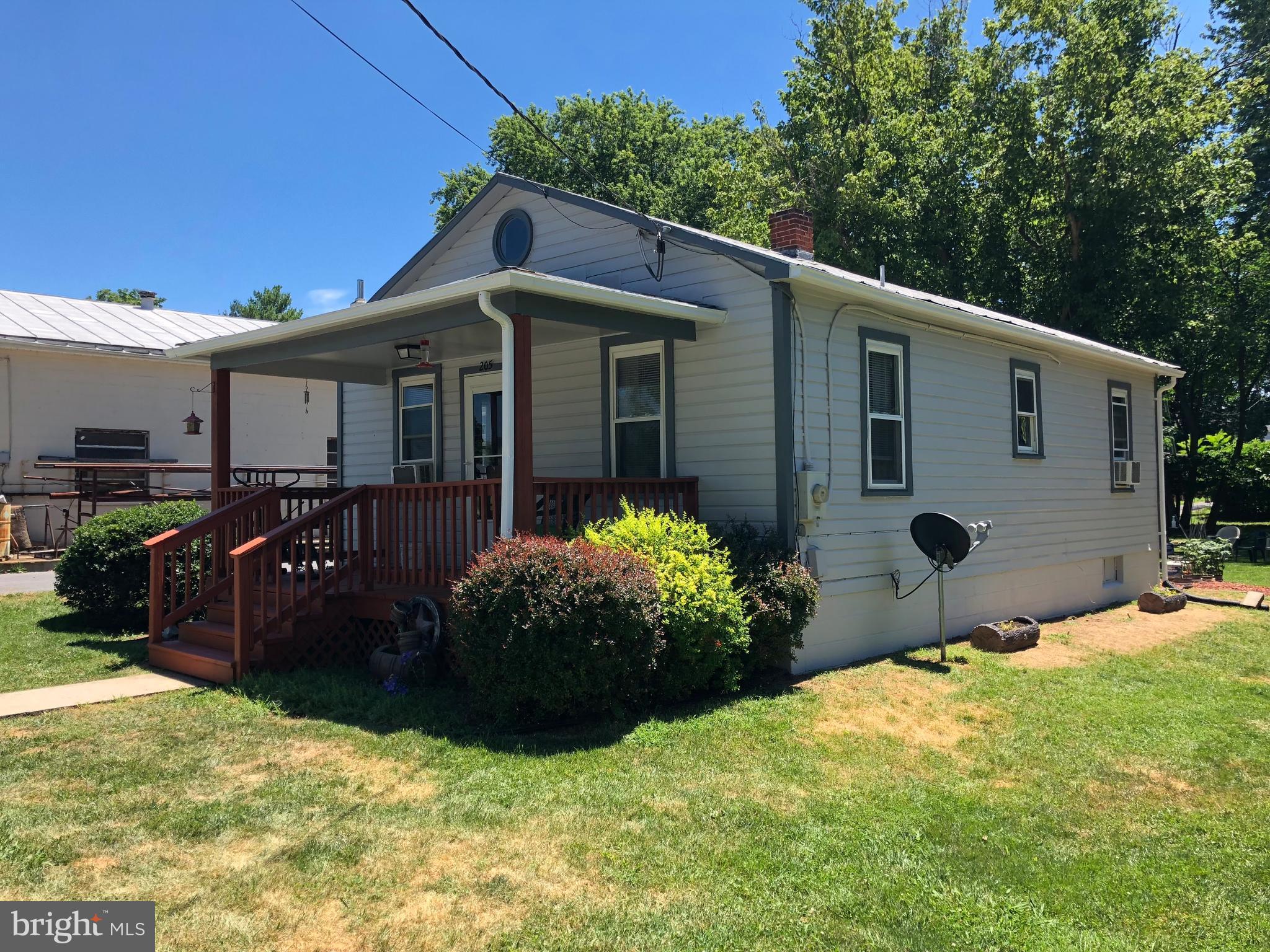 205 East 7th Avenue Ranson, WV 25438 - Photo 1 of 29 a front view of house with yard
